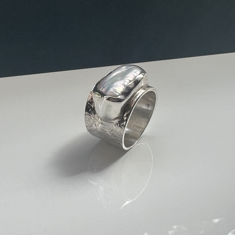 Handmade, silver 925°, ring from the fire series, with natural baroque pearl.
